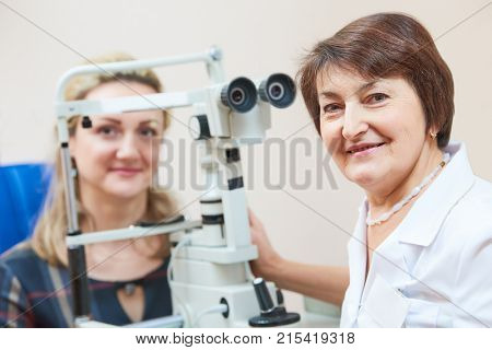 ophthalmology. female doctor portrait with patient