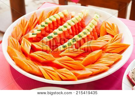 Fresh carving papaya fruit Ripe cut  thailand