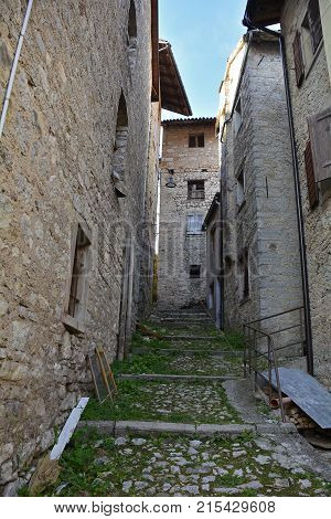 A small street in the hill village of Erto in Friuli Venezia Giulia north east Italy. The village is famous locally for having being evacuated following the 1963 Vajont Dam disaster.