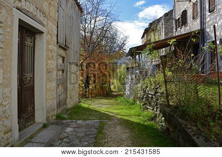 A small street in the hill village of Erto in Friuli Venezia Giulia north east Italy. The village is famous locally for having being evacuated following the 1963 Vajont Dam disaster.