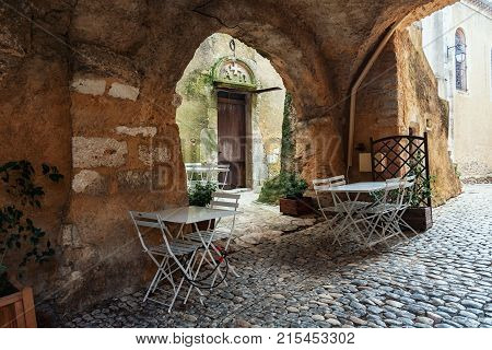 Restaurant in a narrow street of the village Saint Montan in the Ardeche region of France