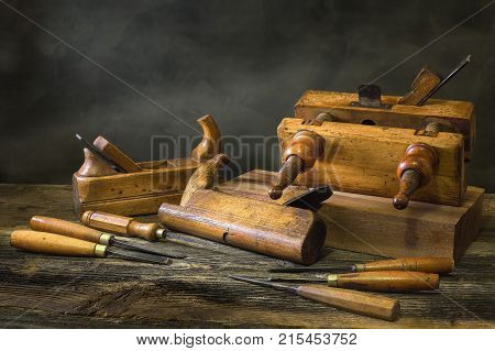 Still life with carpentry tools bench planes of the joiner wood carving chisel