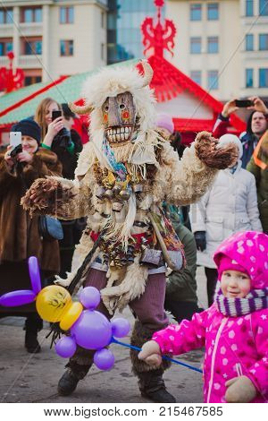 Russia. Moscow.Red square 26 Feb 2017. Carnival Maslenica . fancy dress scary on stilts amused the passers-by on the street