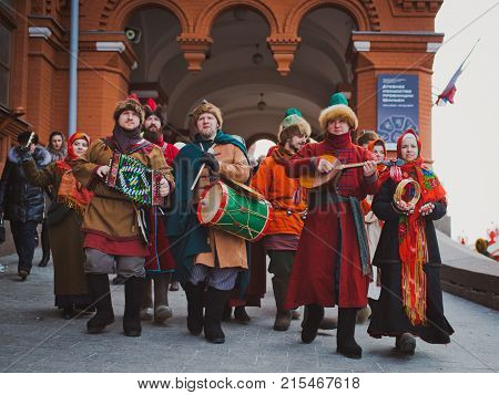 Russia. Moscow.Red square 26 Feb 2017. Carnival Maslenica . participants of the carnival are on the red square playing Russian folk musical instruments