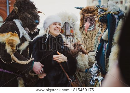 Russia. Moscow.Red square 26 Feb 2017. Carnival Maslenica . fancy dress scary on stilts amused the passers-by on the street