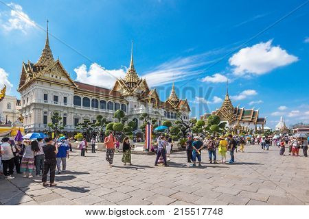 BANGKOK, THAILAND - JANUARY 9 : Tourists visiting Phra Thinang Chakri Maha Prasat in the Grand Palace, Bangkok, Thailand. The Grand Palace is the most city's famous landmark.