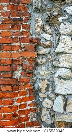 Stone old wall from huge blocks. Background stones. Beautiful textured vintage antique background. Old masonry new brick with a stone.