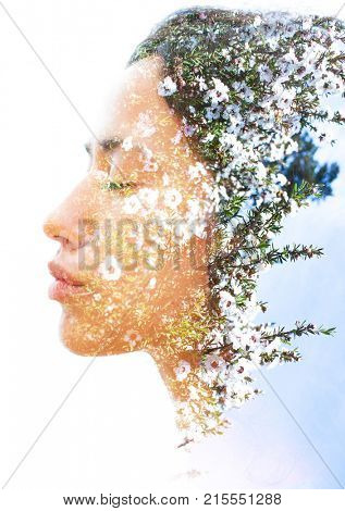 Delicate aspects of nature are highlighted along with her peaceful and relaxed expression
