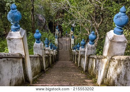 Stairs in ancient Buddhist rock temple in Mulkirigala, Sri Lanka