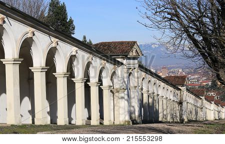 Arcades And City Of Vicenza Italy  In Background