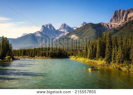 Rafting on the Bow River in Banff National Park near Canmore in the Summer, Canadian Rockies, Alberta, Canada.
