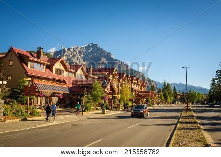 BANFF, ALBERTA, CANADA - JUNE 27, 2017 : Scenic street view of the Banff Avenue in a sunny summer day. Banff is a resort town and popular tourist destination.