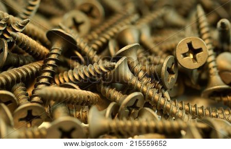 self tapping metal screw with hex head on a white background