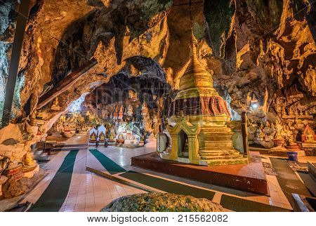 PINDAYA, MYANMAR - JANUARY 25, 2016 : Buddha statues inside the Shwe Umin Pagoda Paya, Myanmar. Pindaya Caves are a famous Buddhist pilgrimage site and a tourist attraction. HDR processed.