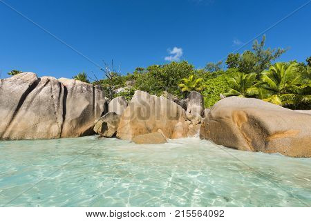 Beautiful and a famous beach Anse Lazio seen from the sea, Praslin island, Seychelles. 