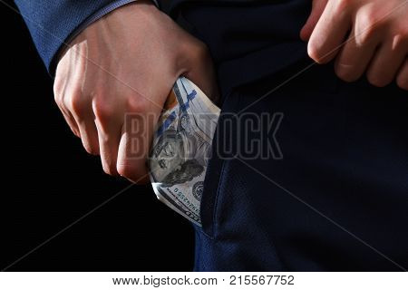 Concept for corruption bankruptcy bail crime bribing fraud auction bidding Bundle of dollar cash in hand
