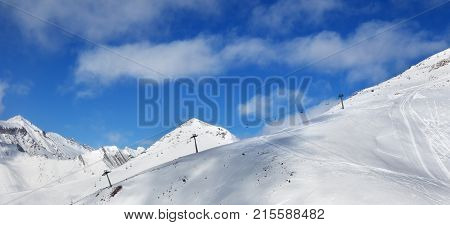 Panoramic View On Off-piste Slope And Chair-lift On Ski Resort