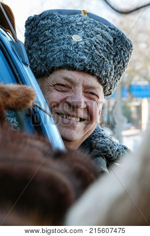 ZABOLOTTIA UKRAINE - 20 January 2009: Man in papakha at local market in winter