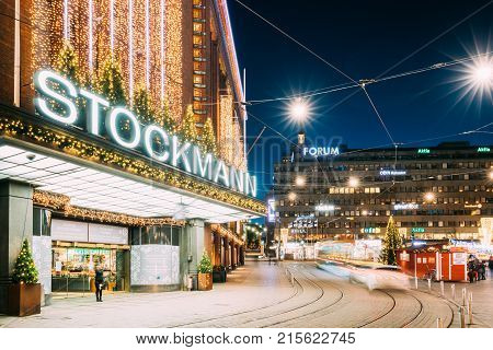 Helsinki, Finland - December 6, 2016: Building Of Stockmann Department Store On Mannerheim Avenue Street In Evening Christmas Xmas New Year Festive Illumination. It Is Finnish Company Of Retail Trade