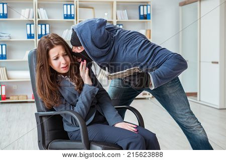Criminal taking businesswoman as hostage in office