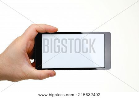 Male hand hoding smartphone isolated on white background. You can insert an image image of your text for the concept or project development of mobile applications and their advertising mobile devices
