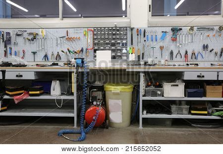 Workshop With Large Workbench And A Large Number Of Tools For Ma