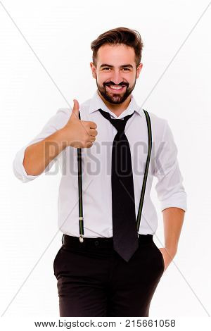 Smiling man on white background showing thumb up. hadsome beardy guy cheerfully smiling.