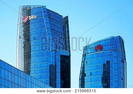 Vilnius Lithuania - August 8 2017: Huawei Technologies and Telia company headquarter in the modern office building skyscraper in the business district on Europe Square Vilnius Lithuania.