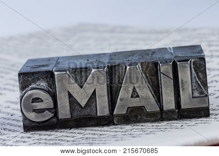 e-mail written in lead letters