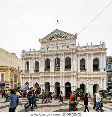 Macao China - March 8 2016: People at Holy House of Mercy on Senado Square in Historical old city center in Macao China.