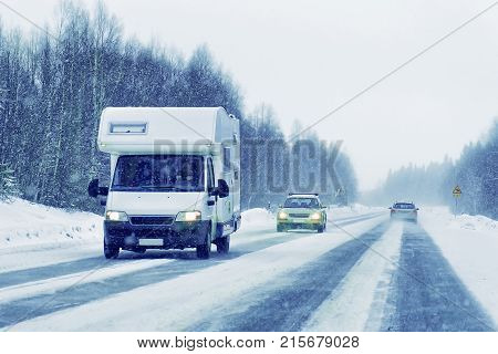 Caravan In Road At Winter Rovaniemi