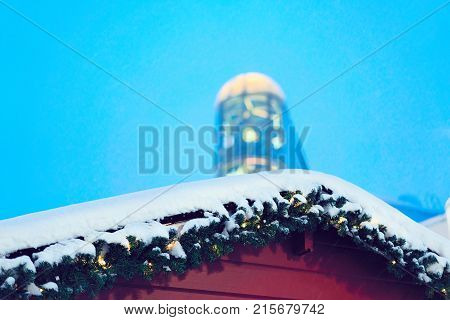 Fragment of souvenir house on Lordi Square in winter Rovaniemi Lapland Finland at night.