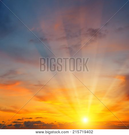 cloudy sky and bright sunrise over the horizon