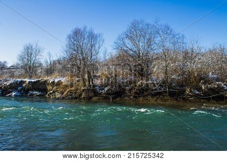 River In Winter. Rapids Of Stormy River. Winter Landscape.