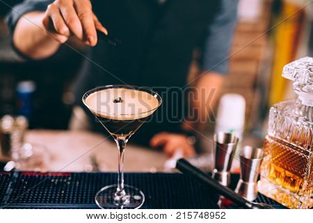 Iced Coffee, Whiskey Based Irish Cocktail. Close Up Of Bartender Hand Preparing Beverage