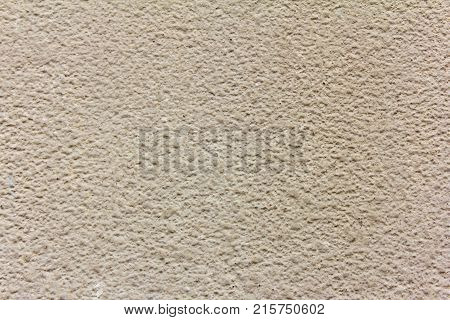 Abstract beige background texture of a rough surface