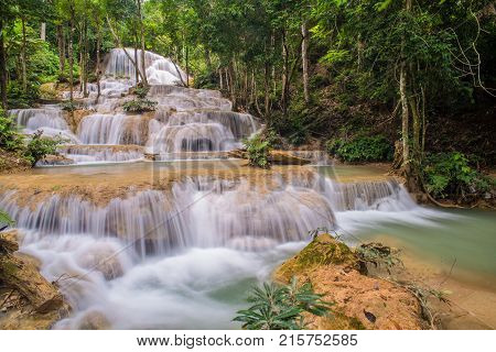 Mae Kae waterfall the Most Famous in Lampang Thailand. Beautiful silky waterfall flow through stones. Mountain stream running over rocks.