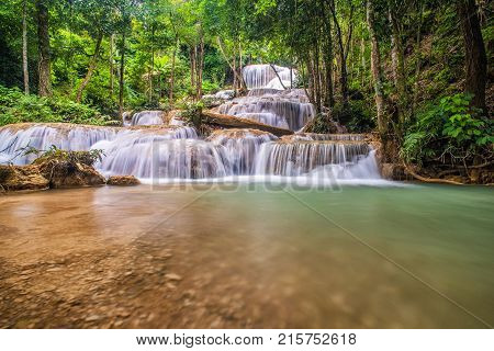 Mae Kae waterfall the Most Famous in Lampang Thailand. Beautiful silky waterfall flow through stones. Mountain stream running over rocks.