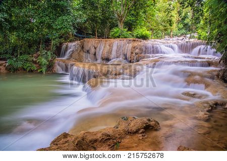 Mae Kae 2 (Kaofu) waterfall the Most Famous in Lampang Thailand. Beautiful silky waterfall flow through stones. Mountain stream running over rocks.