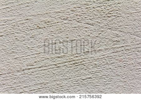 cream or beige background of natural cement or stone old texture