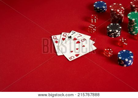 Poker cards and gambling chips on red background. Top view. Copy space. Still life. Flat lay. 2 Pair