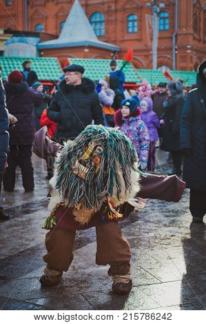 Russia. Moscow.Red square 26 Feb 2017. Carnival Maslenica . fancy dress scary on stilts amused the passers-by on the street