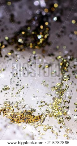 Closeup photograph of epitaxy of pyrite on calcite. Golden details. Natural phenomenon.