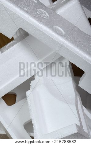 Background Image With Beige Cardboard Paper And Styrofoam Boxes Disgarded As Rubbish. The Concept Of