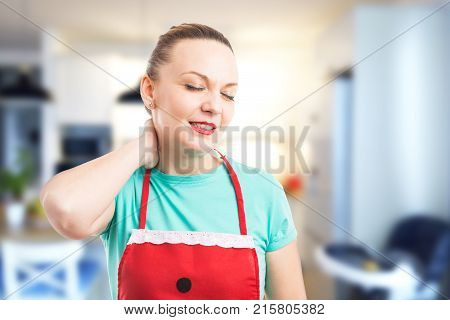 Tired And Exhausted Housekeeper Or Maid Grabbing Scruff