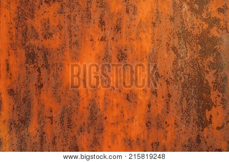 Bright orange rusty metal background. Grunge iron plate