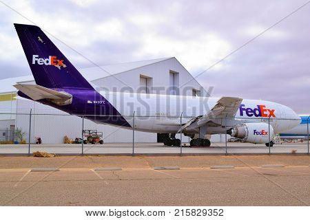 November 27, 2017 in Victorville, CA:  Retired FedEx Airbus 310 aircraft stored at the Victorville Airport Airplane Boneyard in Victorville, CA where airlines can retire older planes to be resold or scrapped for parts