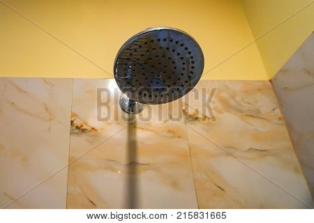 Hard water calcium deposit and corrosion on chrome shower tap