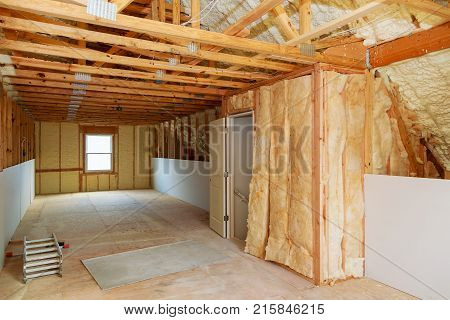 Inside Wall Insulation In Wooden House, Building Under Construction