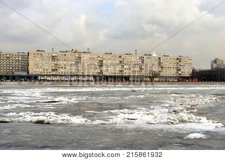 View of Neva river on the outskirts of St. Petersburg at winter day Russia.